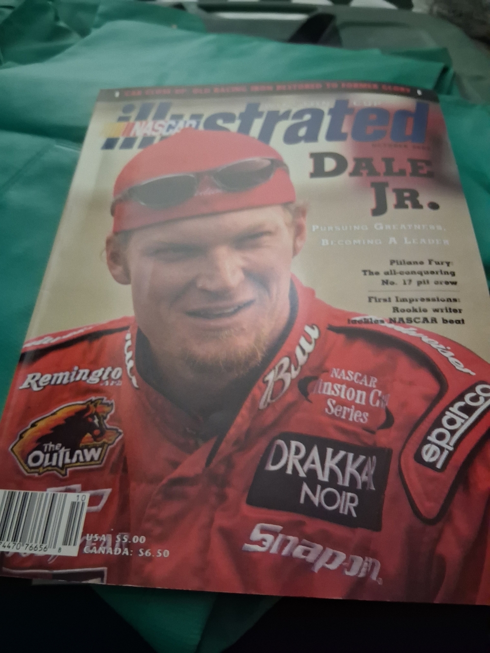 Nascar red racing jacket magazine cover featuring Dale Jr.
